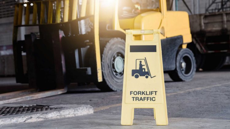 Yellow sign focused on warehouse pedestrian safety