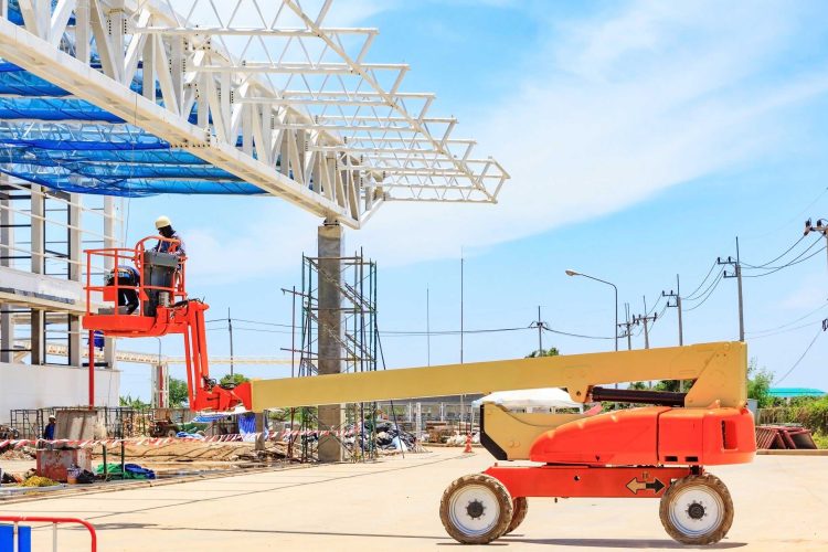 Man lifts for sale outside at a construction site