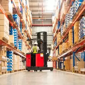 The Importance of Planned Forklift Maintenance Warehouse forklift in between aisles
