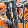 Two employee conducting a forklift inspection