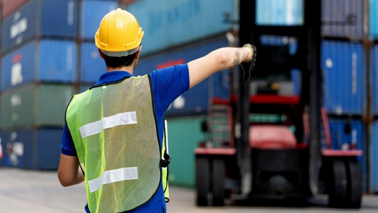 Forklift spotter using forklift hand signals